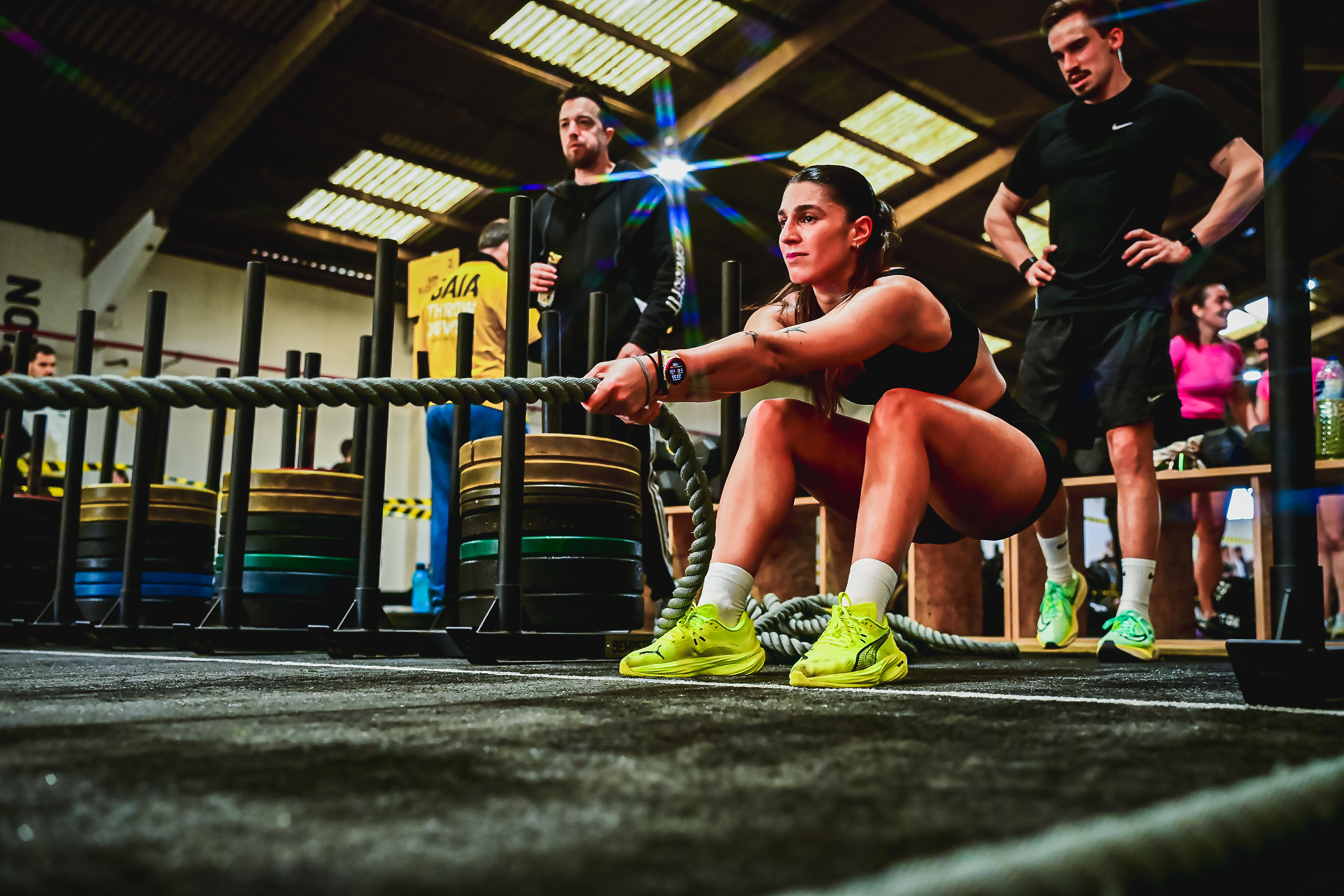 Athlete pulls a battle rope during AVYNT League competition