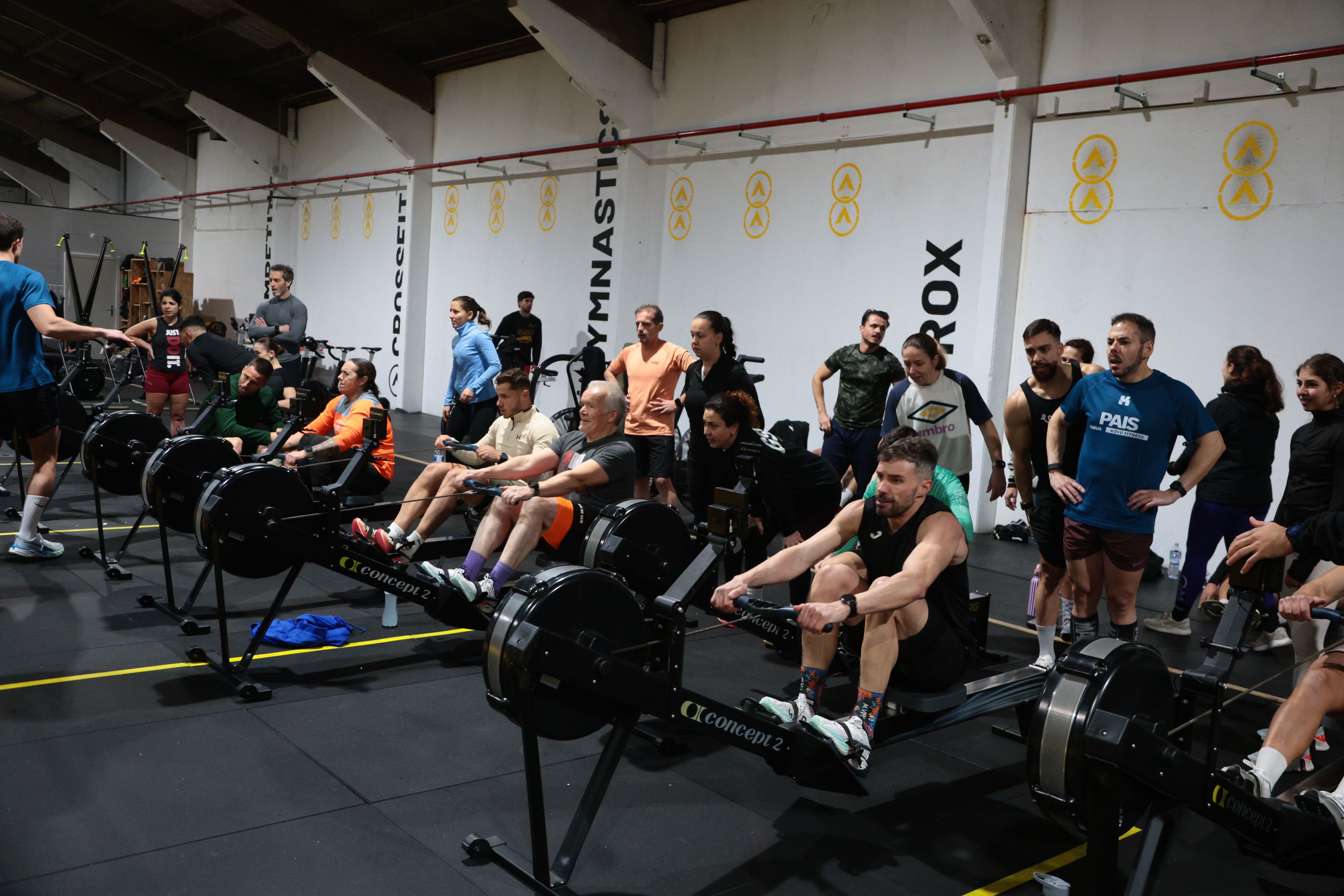 Athletes completing a group rowing session at the Army Performance Hybrid Training Camp