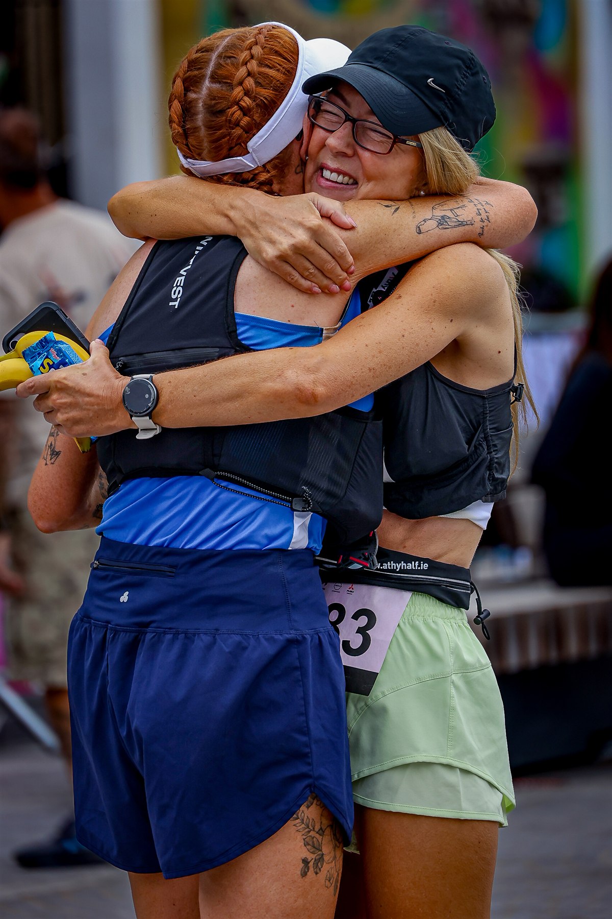 Two women embrace after completing their race at the 2026 Athy Half Marathon
