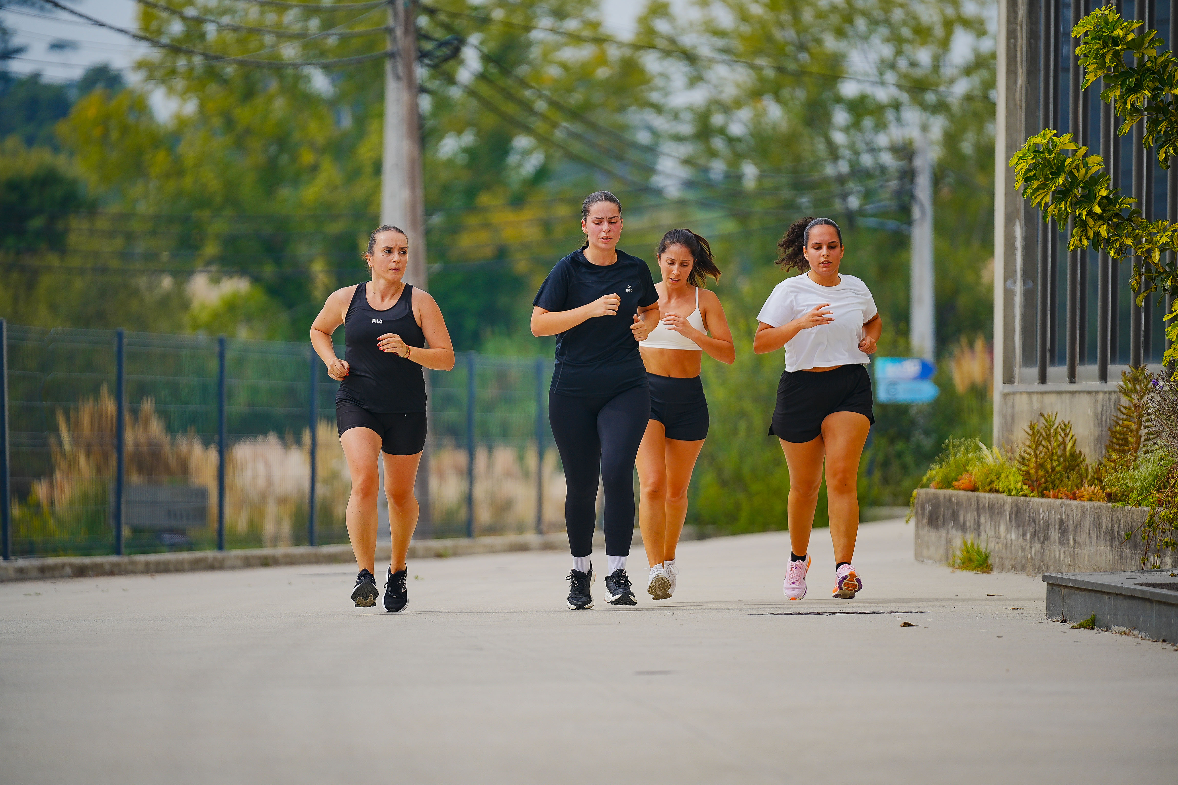 Four athletes run together during the fourth AVYNT simulation