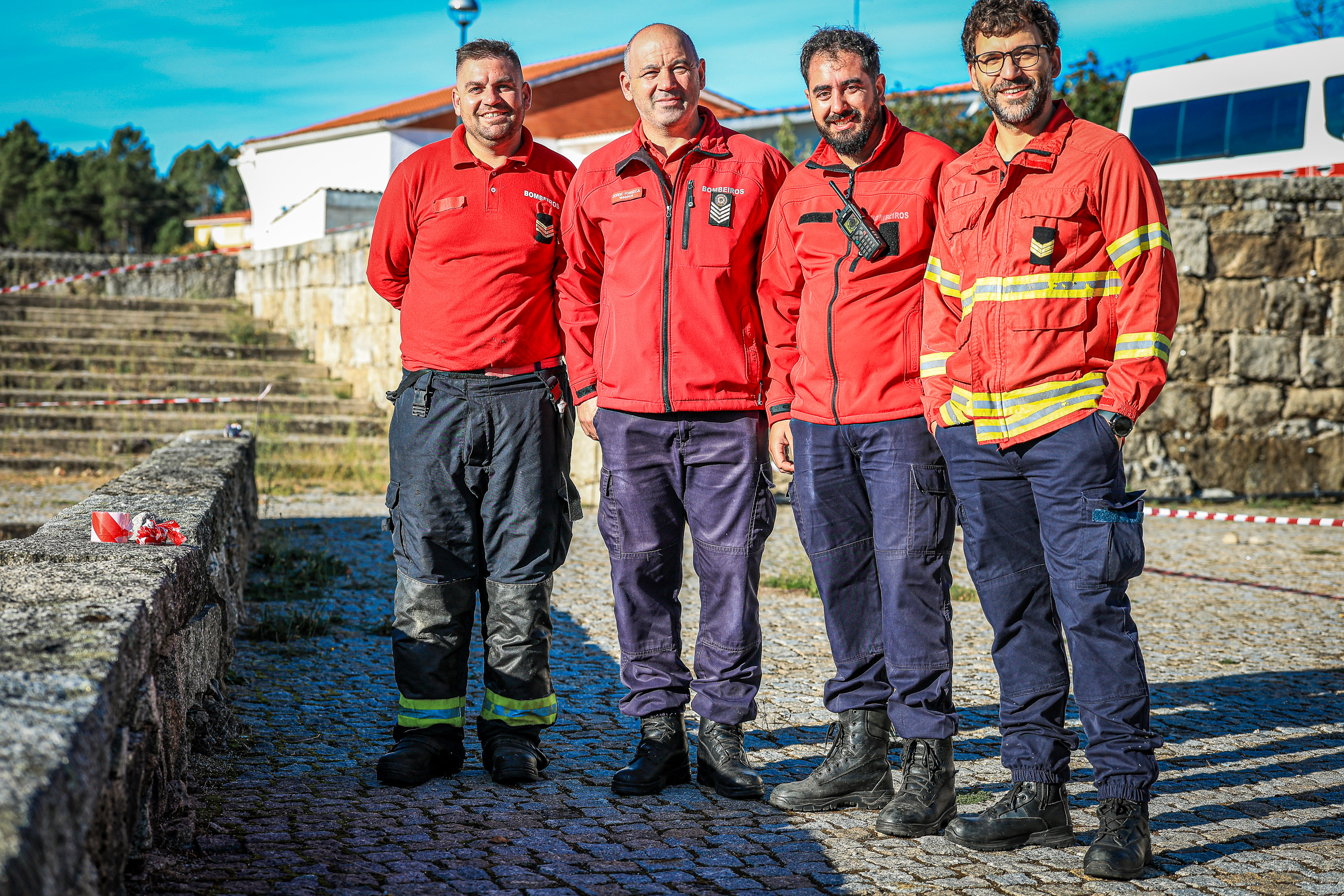 A group of firefighters poses for a portrait at Barrelas Fire Challenge