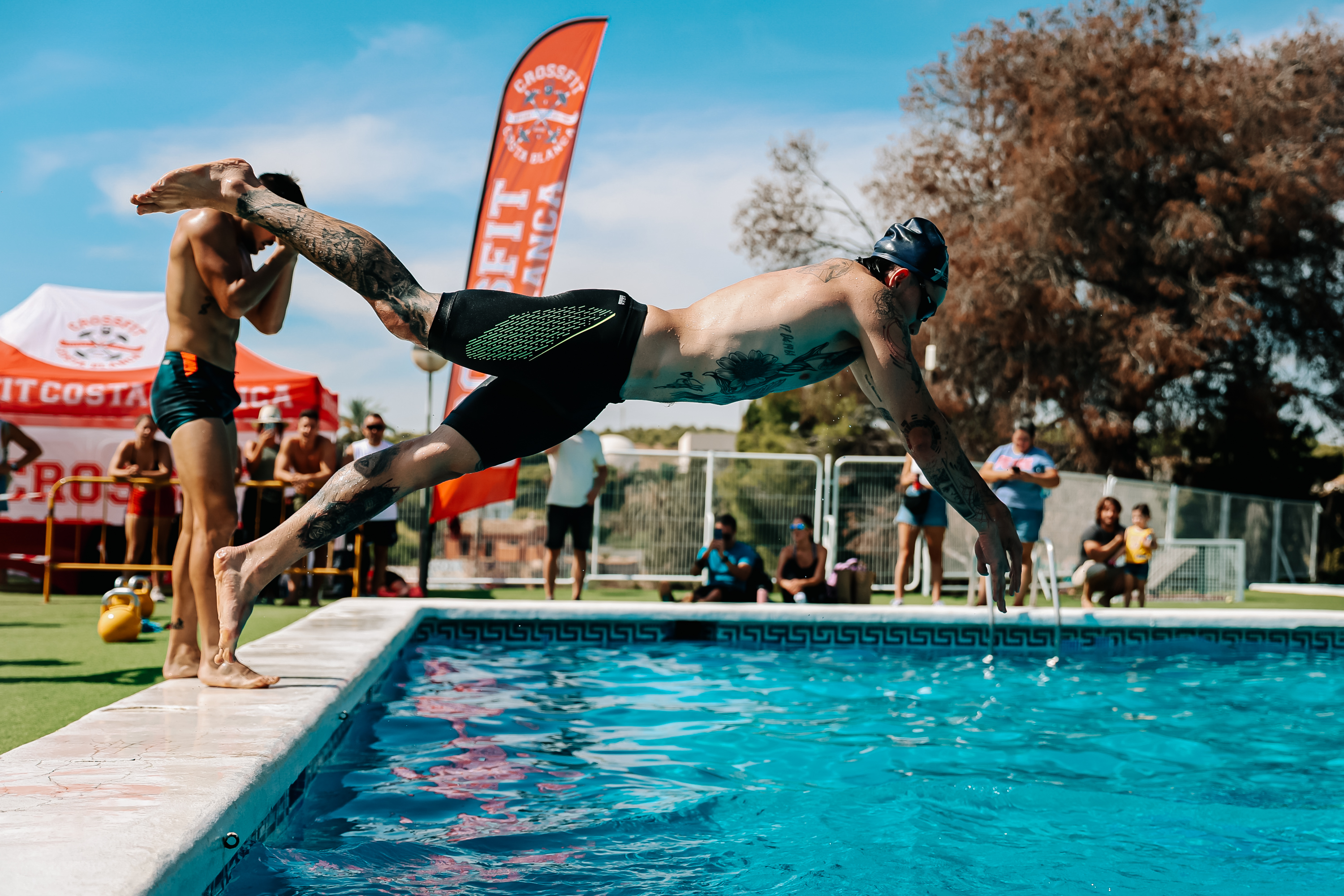 An athlete dives into a pool during the Costa Blanca Games in Alicante