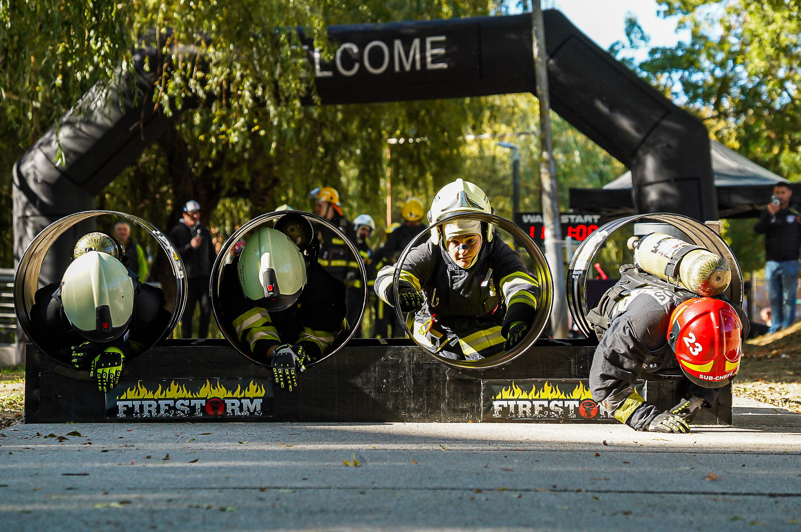 Firefighters crawl through circular tunnels during Firestorm Challenge 2026