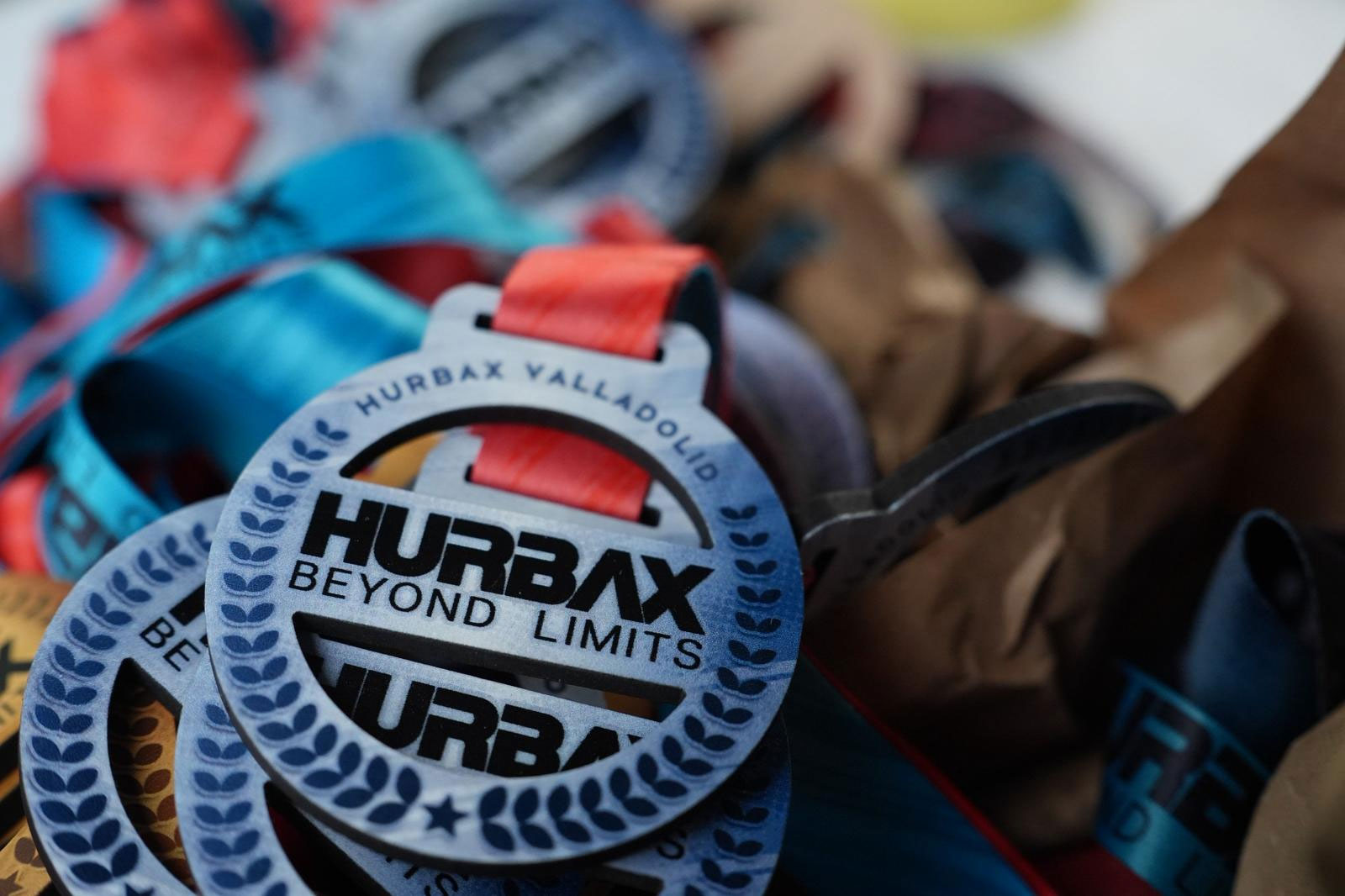 Finisher medals from the Hurbax Beyond Limits stop in Santander