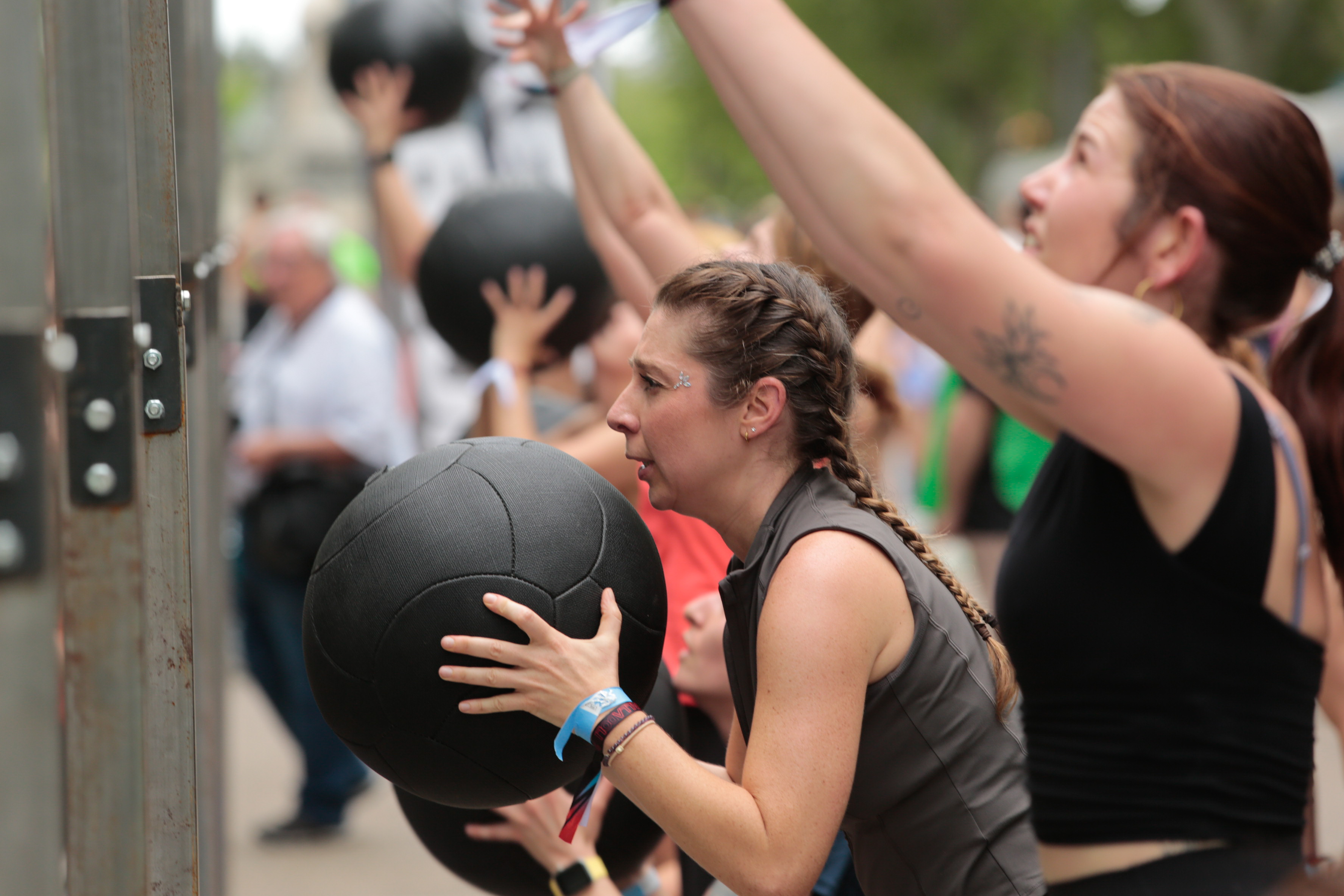 An athlete holding a medicine ball during Hurbax Valladolid