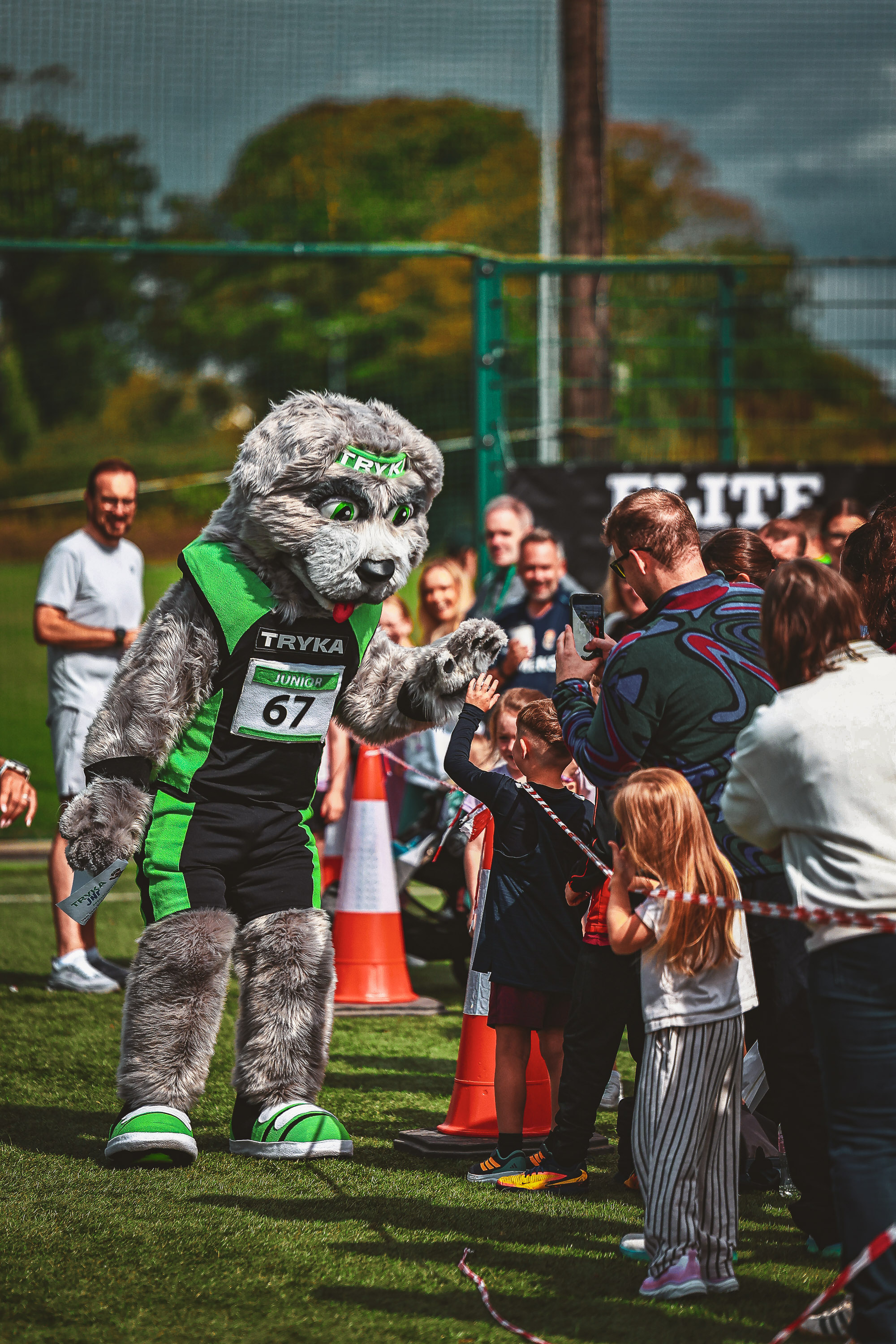 The KIDSROX mascot greets children beside the fitness course in Dublin