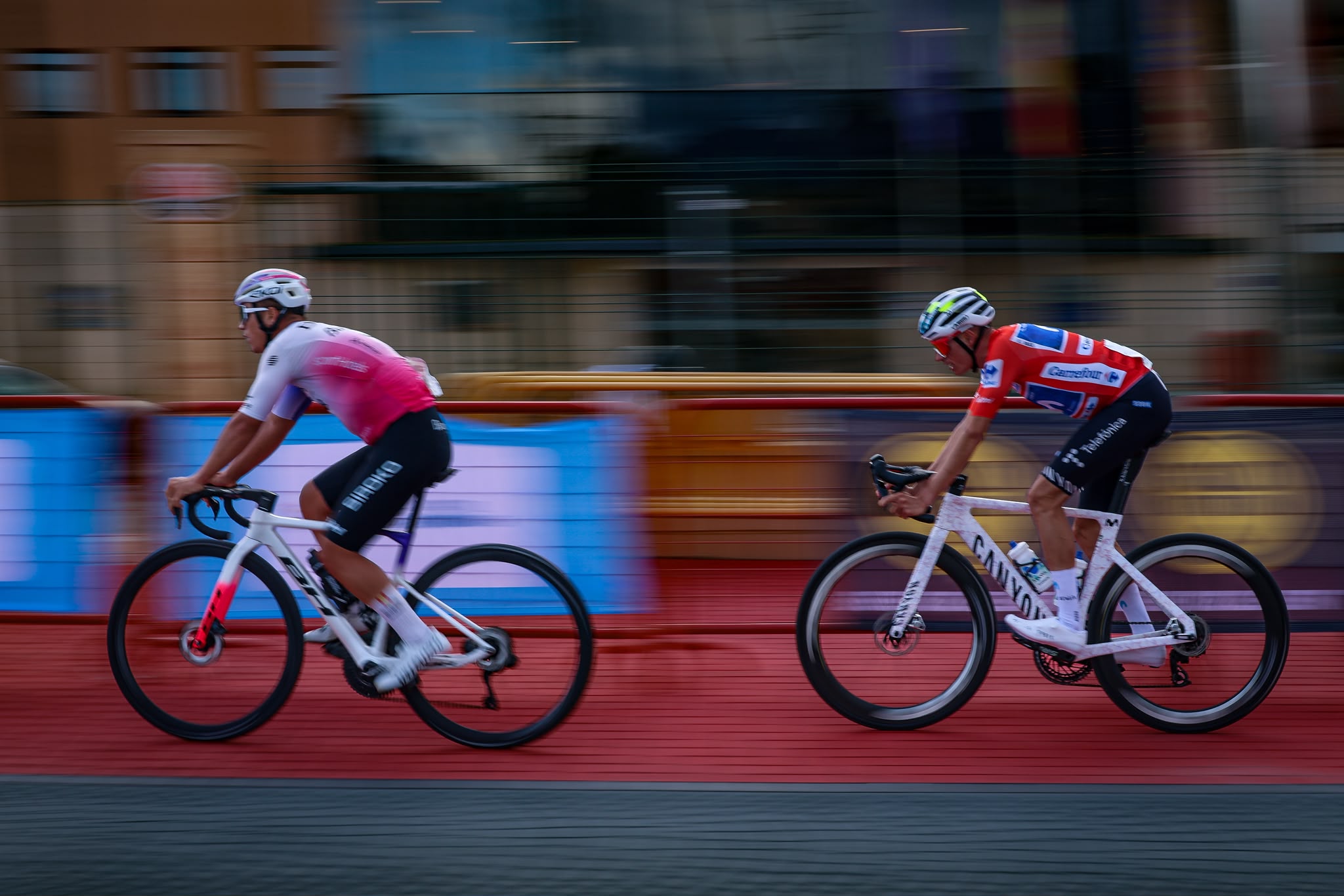 Two cyclists race through La Nucía during the Saturday criterium
