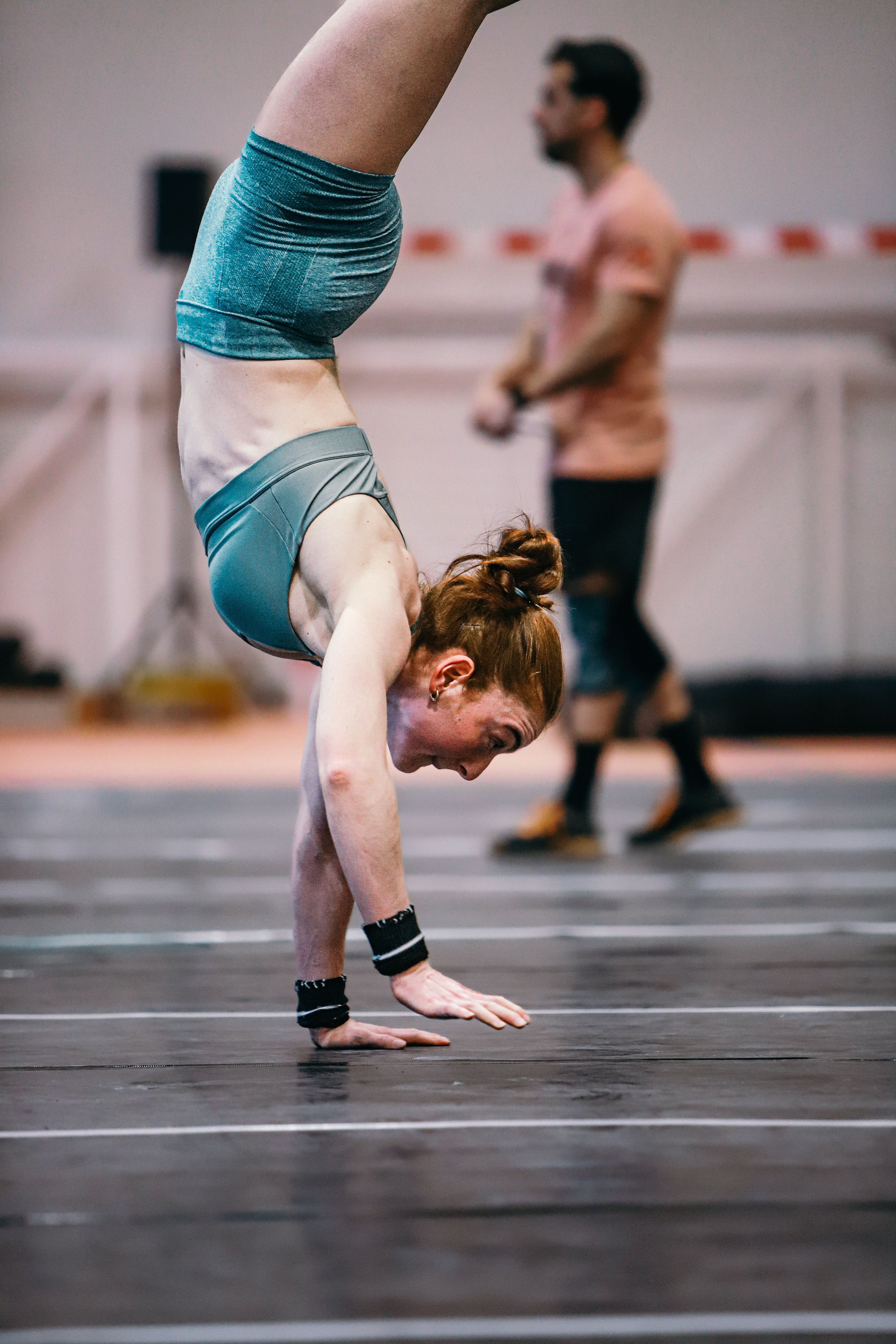Athlete holding a handstand during Matosinhos Throwdown
