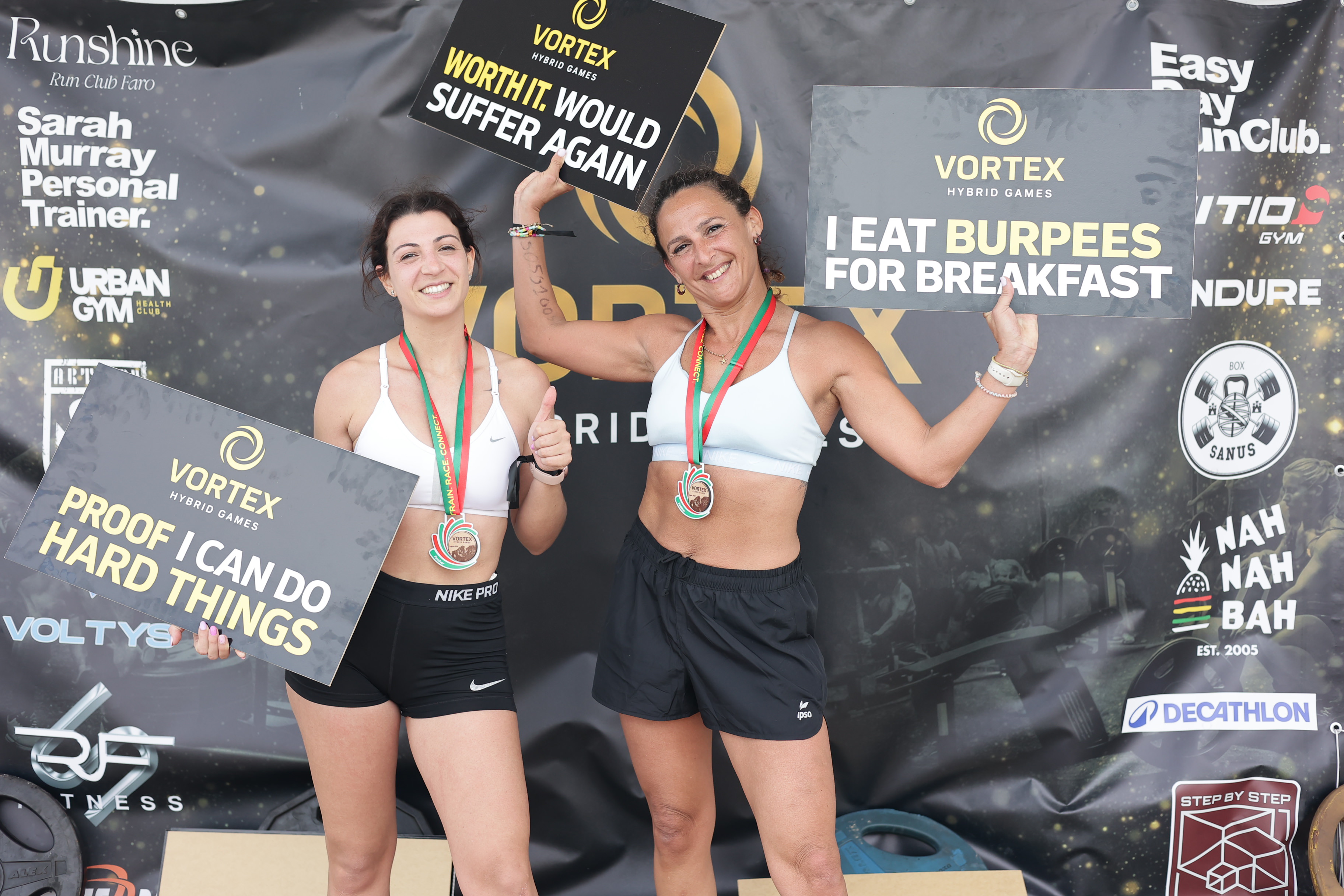 Finishers celebrate on the podium after VORTEX Hybrid Games’ debut Algarve event in Lagos