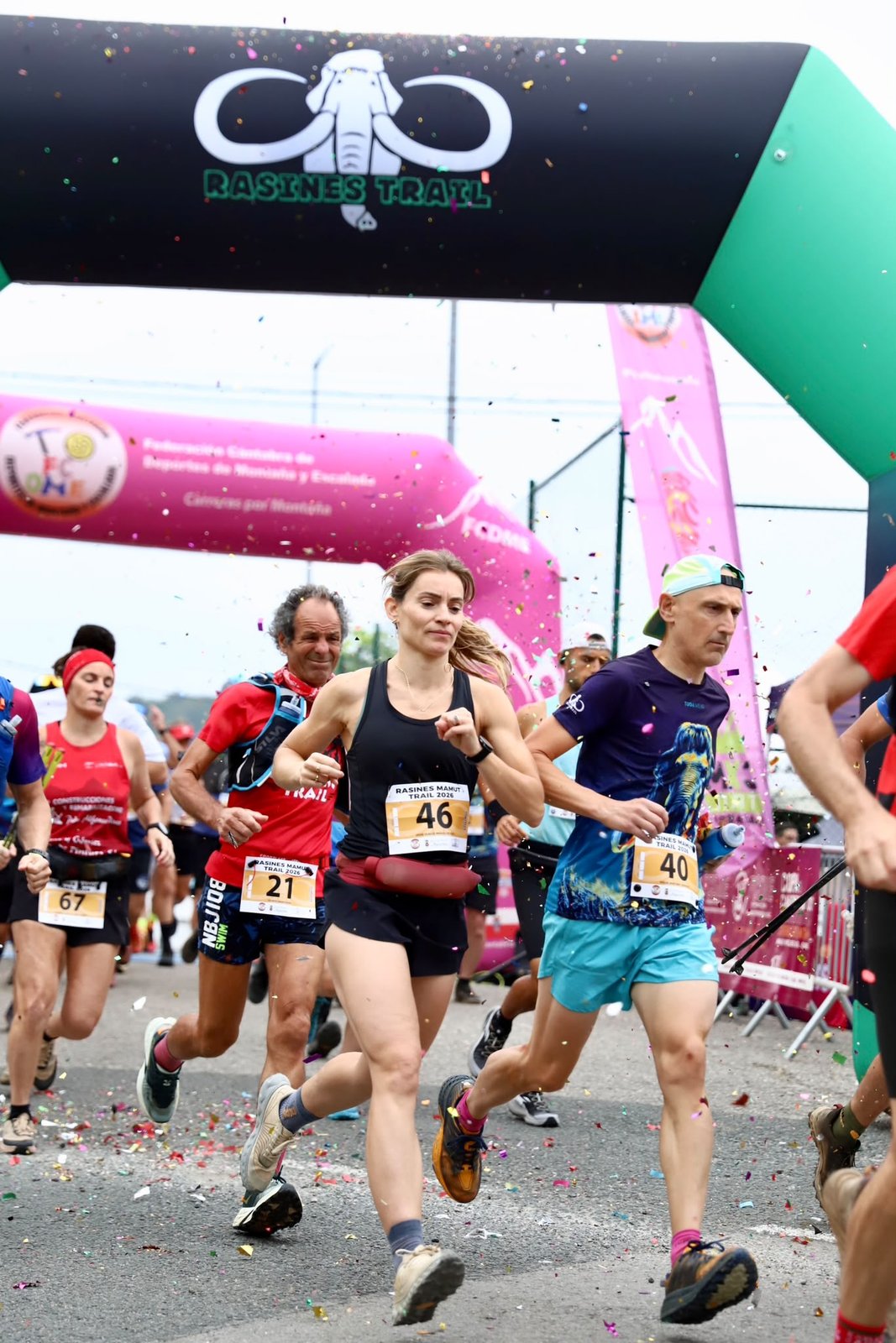 Runners set off from the mass start of Rasines Mamut Trail 2026 beneath an arch banner in Rasines, Cantabria