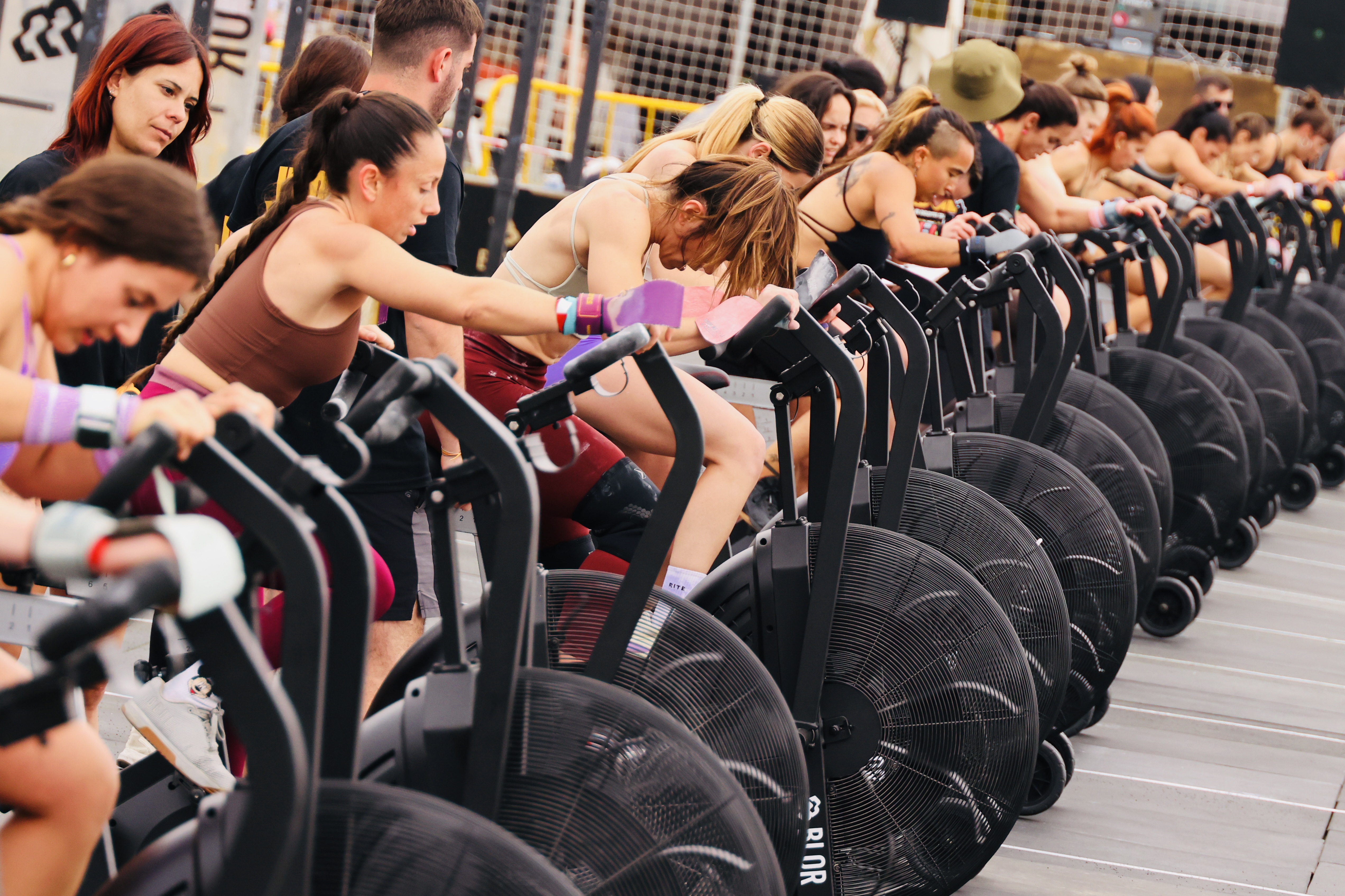 Athletes competing on assault bikes at The Battle Games in Castellón