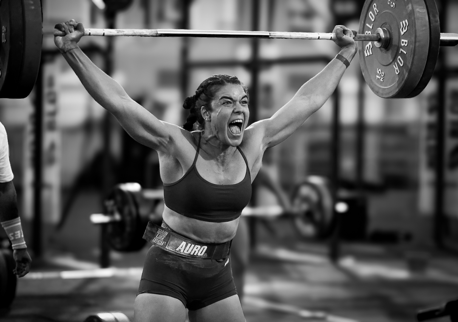 An athlete completing an overhead lift at The Battle Games