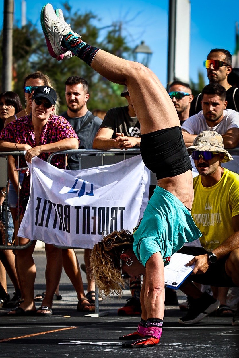 An athlete competes in a gymnastics movement at Trident Battle in Nettuno